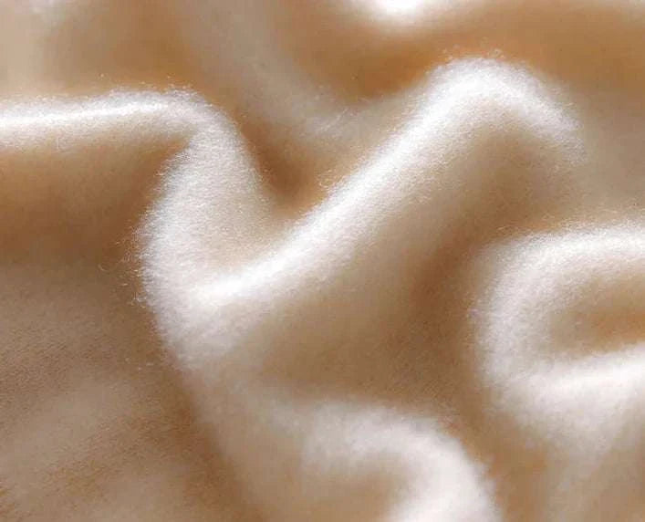 Luxurious wool texture of cold season pure wool sweater.