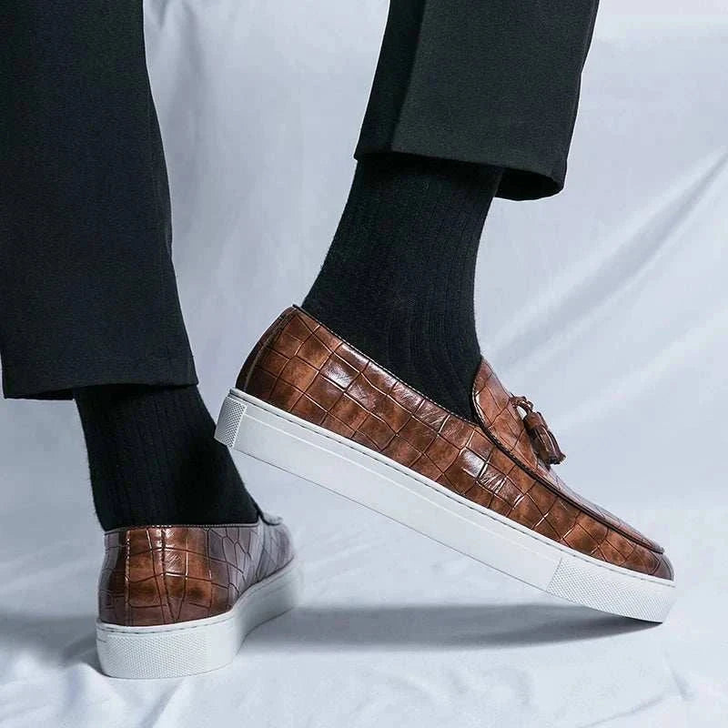 Casual slip-on loafers in brown suede with cushioned insoles for style and comfort.