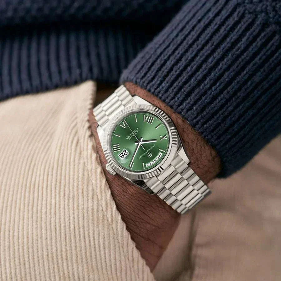 Business stainless steel classic watch on wrist, showcasing elegant design and precise timekeeping.