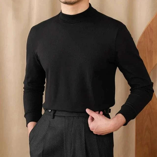 Soft half turtleneck sweater in black for men, made of polyester.