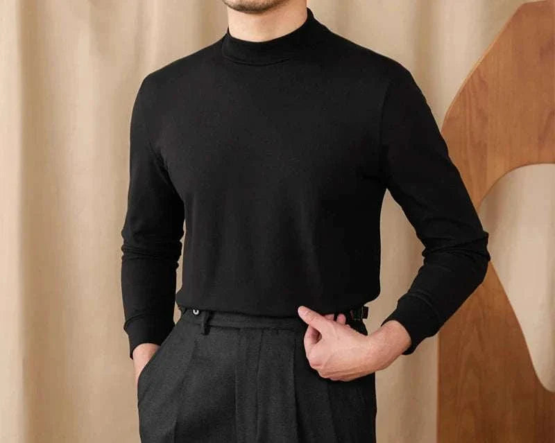 Soft half turtleneck sweater in black for men, made of polyester.
