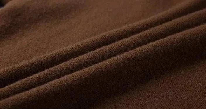 Close-up of brown fabric texture of Korean smart casual sweater.