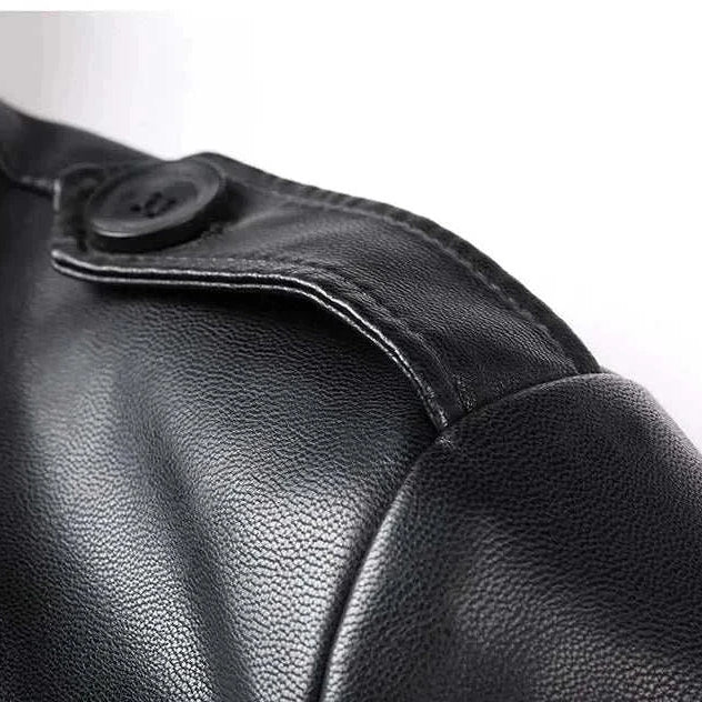 PU leather long coat detail showcasing faux leather texture and button.