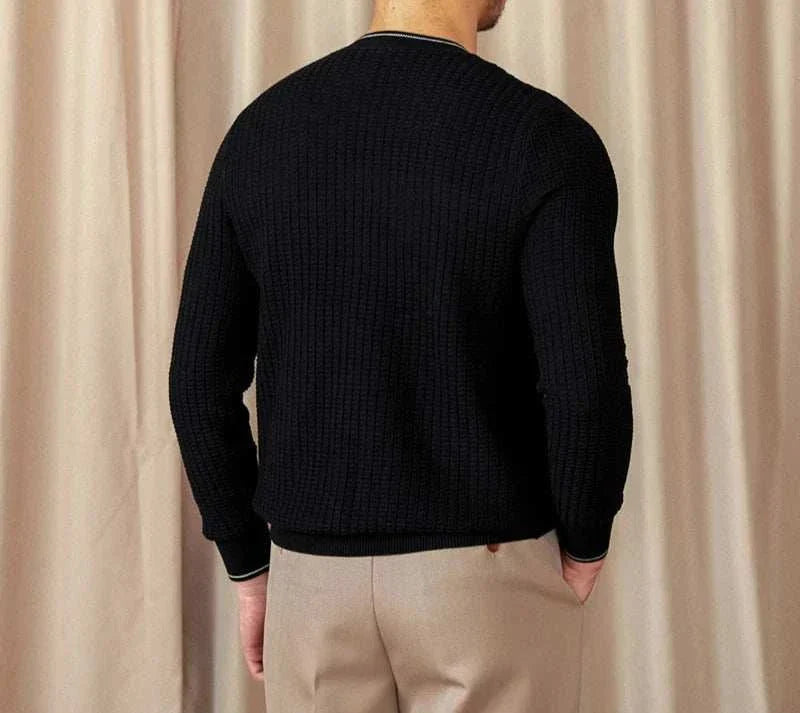 Back view of a men's black winter wool sweater, featuring a cozy and stylish design for cold weather.
