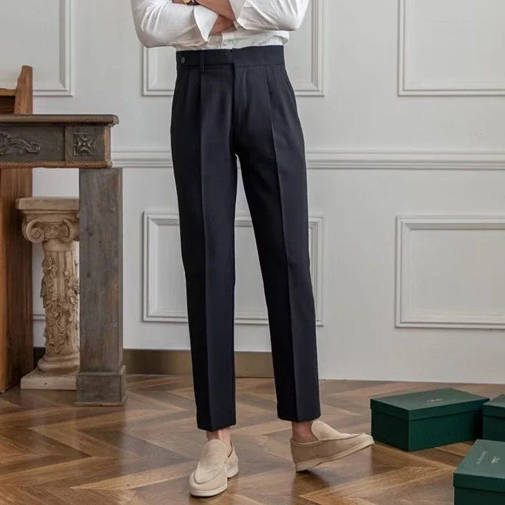 Antonios draped suit pants showcasing Korean-inspired elegance in a smart casual setting.