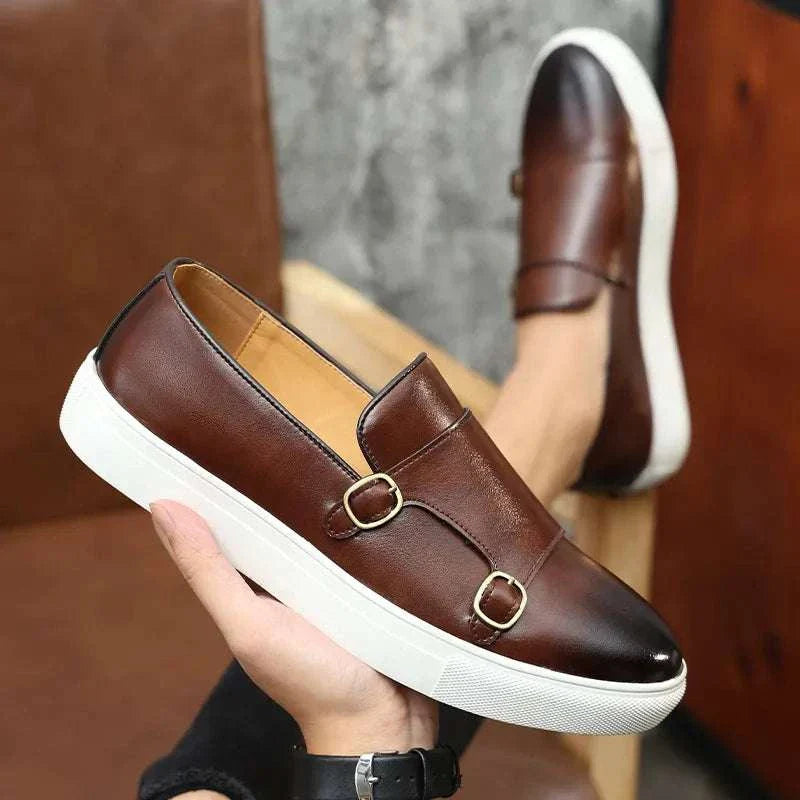 Monk British loafers in brown suede with double buckle design and white sole, perfect for casual and semi-formal events.
