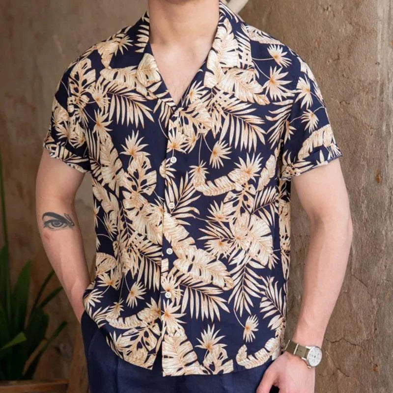 Men's vintage Hawaiian flower shirt with tropical design.