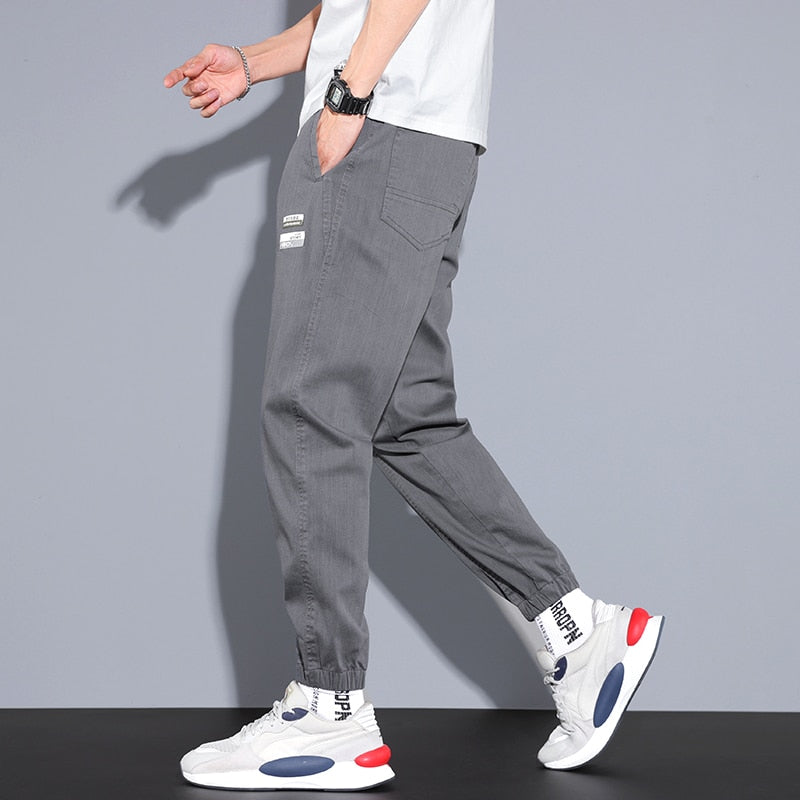 Men's Vinny Loose Pants in grey, relaxed fit joggers for streetwear or workout, casual style.