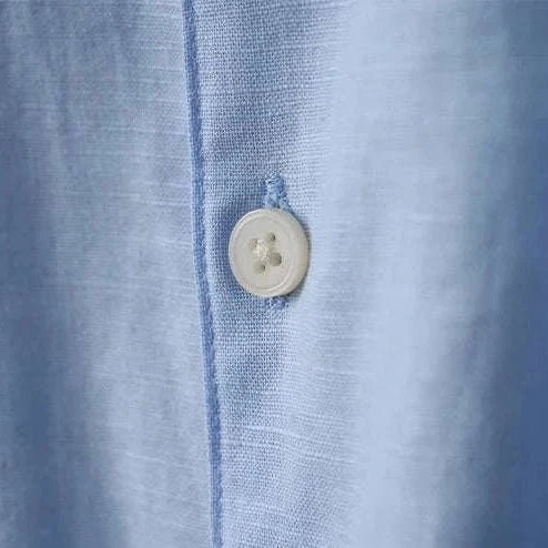 Close-up of Antonios cotton-linen long sleeve shirt, showcasing fabric texture and button detail.