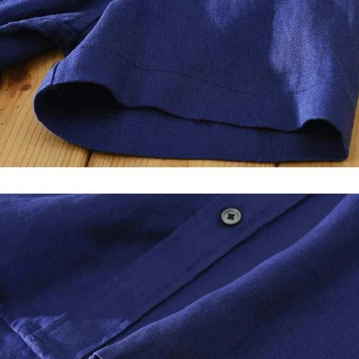 Antonios loose short sleeve summer shirt in solid blue linen fabric close-up.