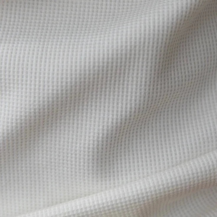 Heavy premium sweater fabric detail in white cotton.