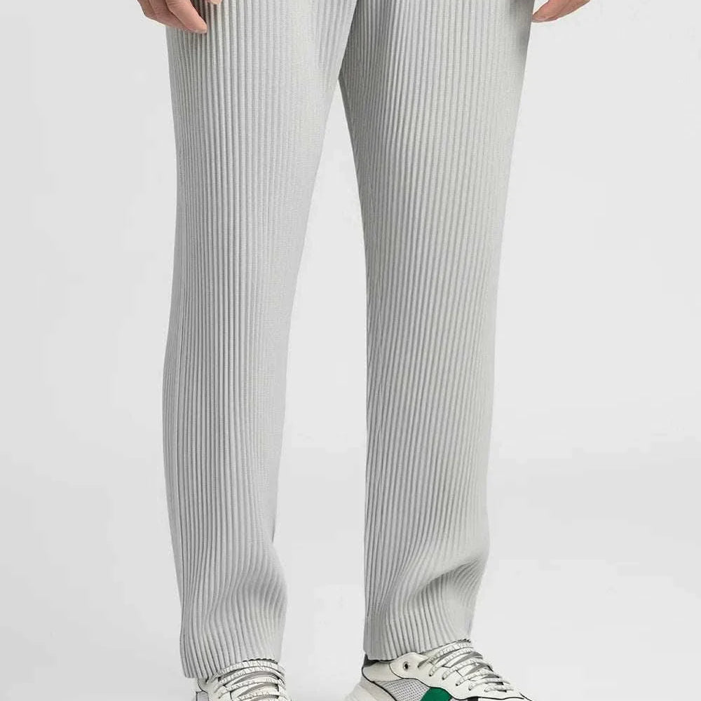 Baggy relaxed fit casual trousers for men in solid color, featuring loose and comfortable style.