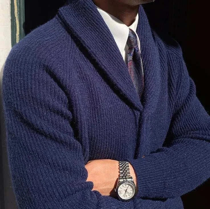 Oxford premium cardigan in navy, worn with a dress shirt and watch.