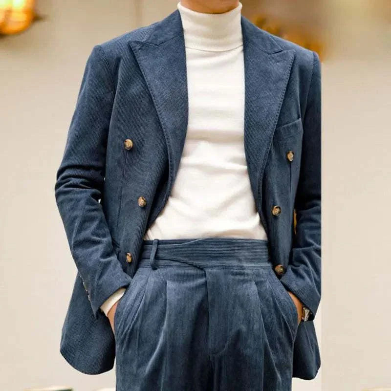 Wedding corduroy double breast suit in blue with a turtleneck for a sophisticated look.