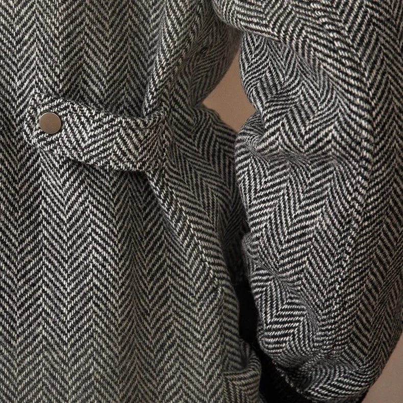 Wool heavy vintage coat with herringbone pattern and button detail.