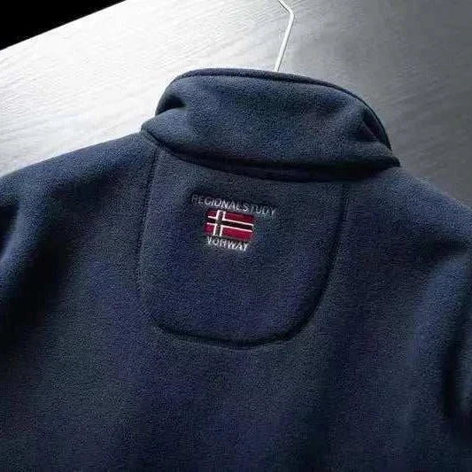 Norway puffer jacket with Norwegian flag patch on the back.