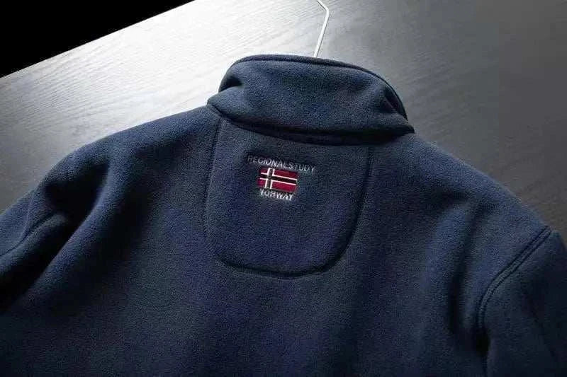 Norway puffer jacket with Norwegian flag patch on the back.