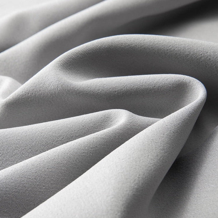 Gray polyester fabric detail of Vinny Office Pants showcasing smooth texture and wrinkle resistance.