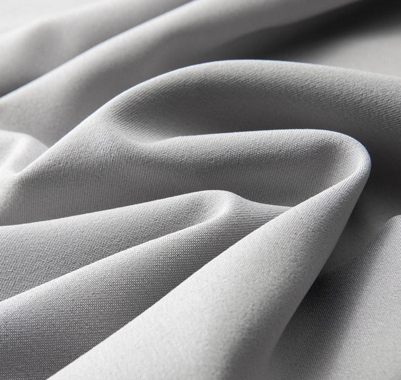 Gray polyester fabric detail of Vinny Office Pants showcasing smooth texture and wrinkle resistance.