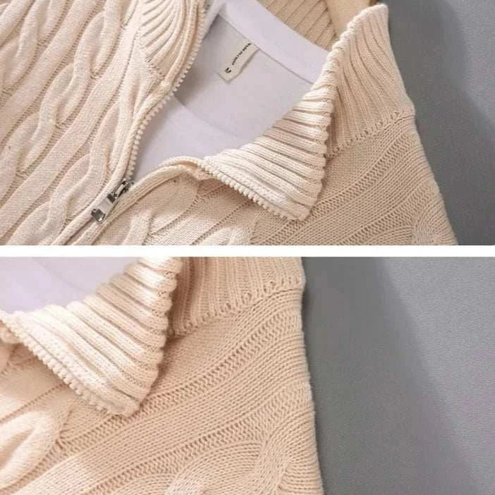 Autumn half zipper braided cotton sweater hanging on a wooden hanger.