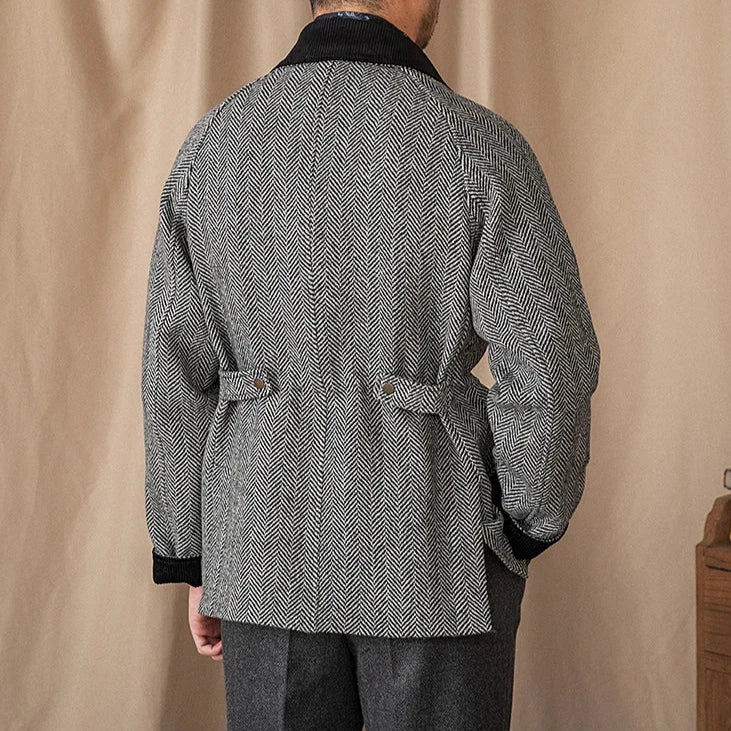 Men's wool heavy vintage coat in black and white herringbone pattern, rear view.