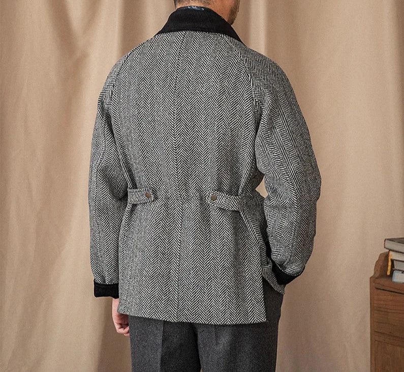 Men's wool heavy vintage coat in black and white herringbone pattern, rear view.