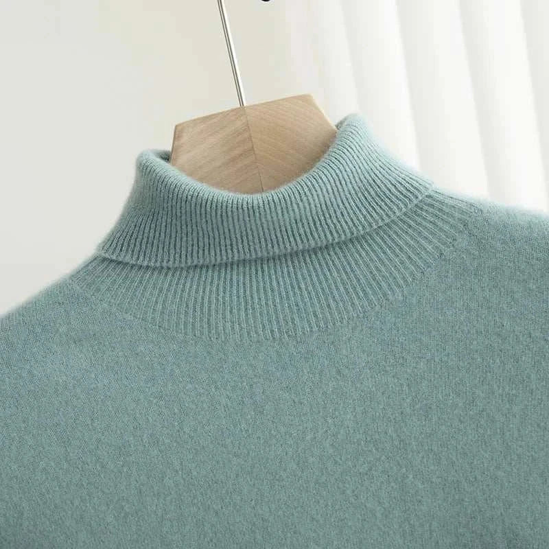 Business wool turtleneck sweater on hanger, showcasing high-quality wool material.