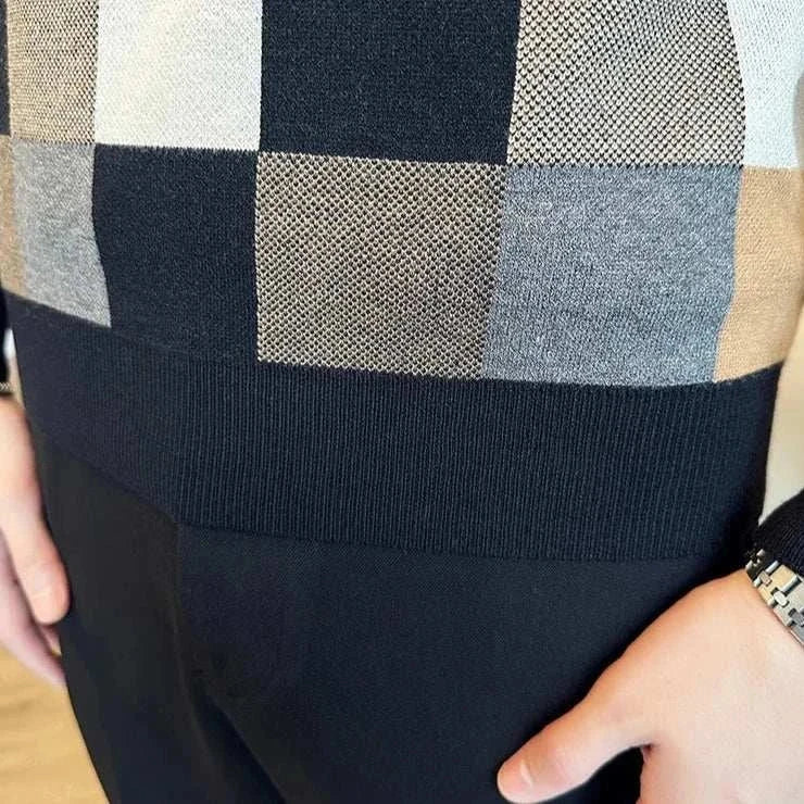 Tone two color sweater with checkered pattern in black and grayish green.