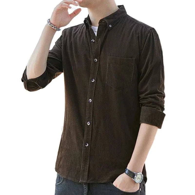 Man wearing a black summer loose style long-sleeve shirt.