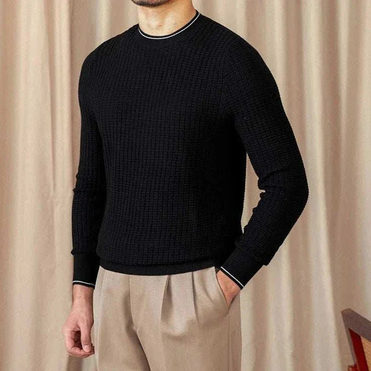 Cozy winter wool sweater for men in black, providing warmth and style.
