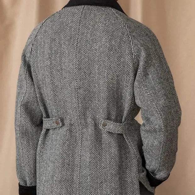 Men's wool heavy vintage coat with herringbone pattern, back view.