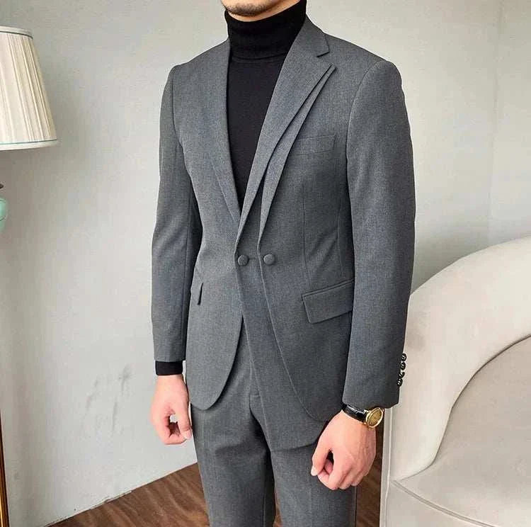 Formal elegant premium 2 piece suit with blazer and pants in polyester.