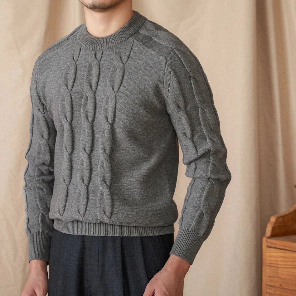 Round neck vintage sweater in gray with textured design.