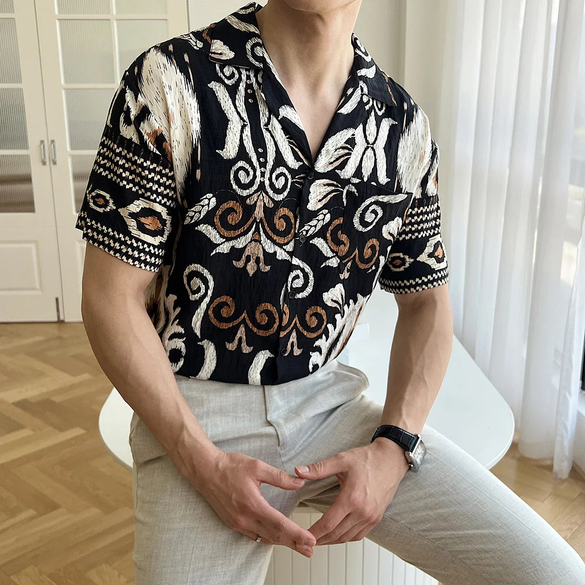 Men's Cuban collar short sleeve shirt in stylish breathable fabric for summer.