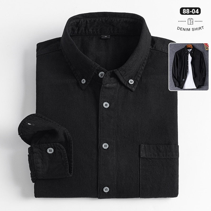 Men's business casual black denim shirt folded with classic collar.