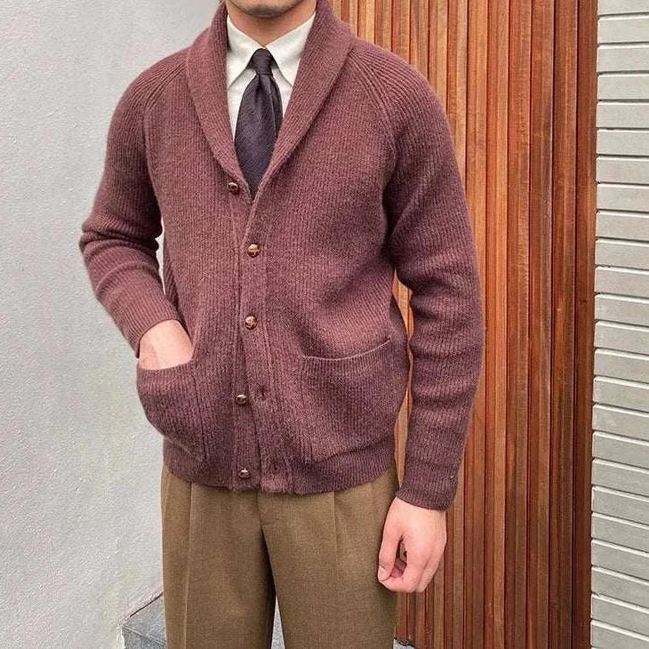 Oxford premium cardigan in brown, worn by a man, showcasing cozy style and elegance.