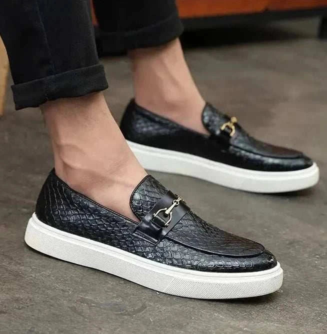 Elegant black embossed casual loafers for men with non-slip rubber outsole.