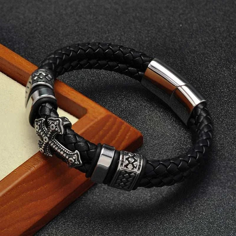 Stainless steel cross magnet bracelet with hypoallergenic PU materials for fashion and therapeutic benefits.