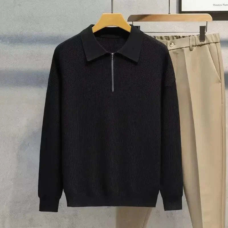 Men's black Antonio's half zipper sweater with a collar, cozy polyester and wool blend, hanging on a wooden hanger.