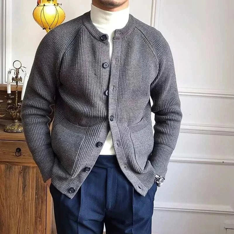 Men's Antonios winter cardigan in gray with button-up front and pockets.