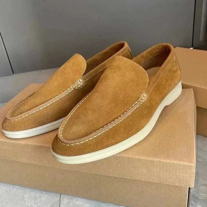 Suede elegant loafers made of soft sheep leather for sophistication and comfort.