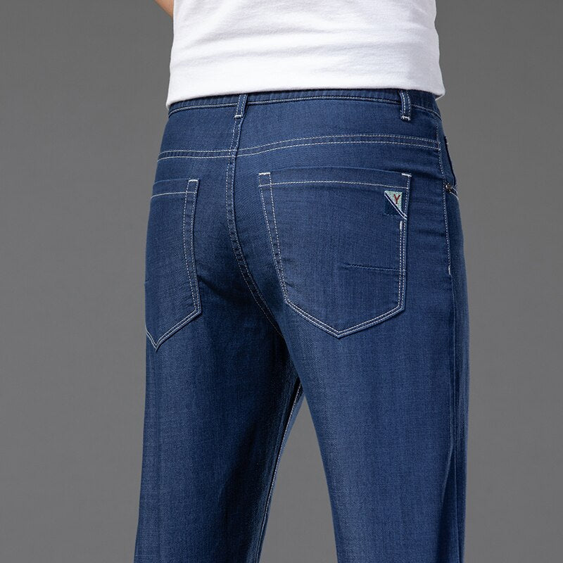 Vinny Jeans in dark blue, showcasing back pocket details and comfortable fit.