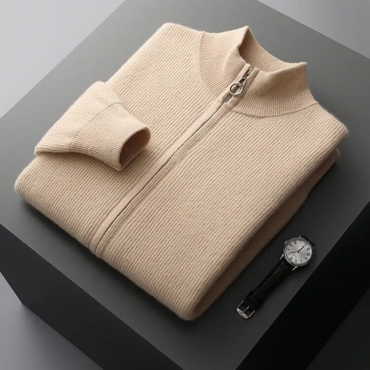 Pure wool cardigan with a solid pattern, folded near a watch on a table.