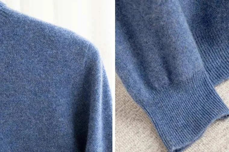 Close-up of blue business wool turtleneck sweater fabric and cuff details.