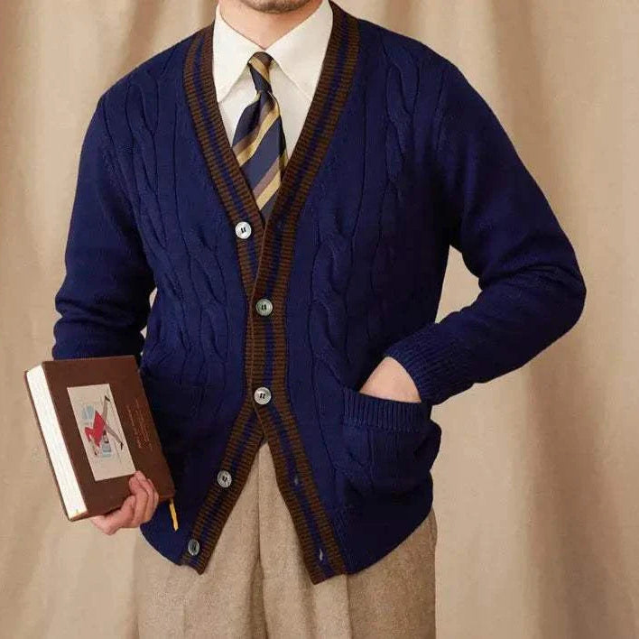 Antonios twisted knit cardigan in vintage Italian style on a model holding a book.