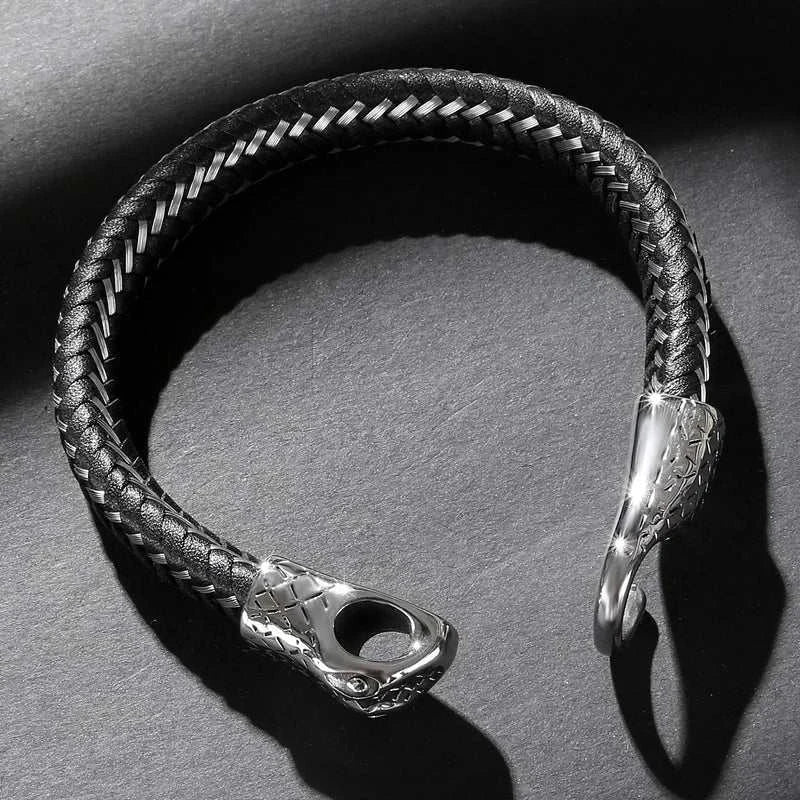 Snake leather bracelet with stainless steel detailing.