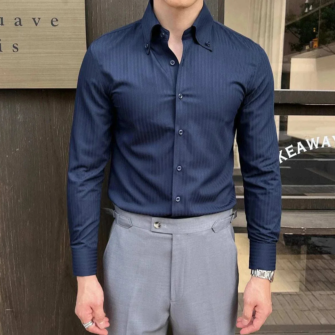 Business casual slim fit shirt with long sleeves in solid dark color, perfect for office and elegant occasions.