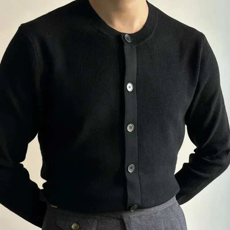 Italian trendy men's cardigan in soft, black fabric with button-up design.