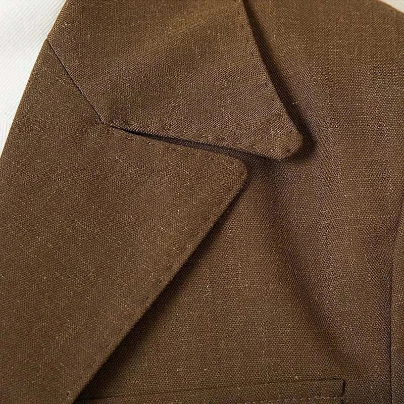 Close-up of the lapel of an autumn vintage old money coat made of high-quality polyester, showcasing elegant craftsmanship.