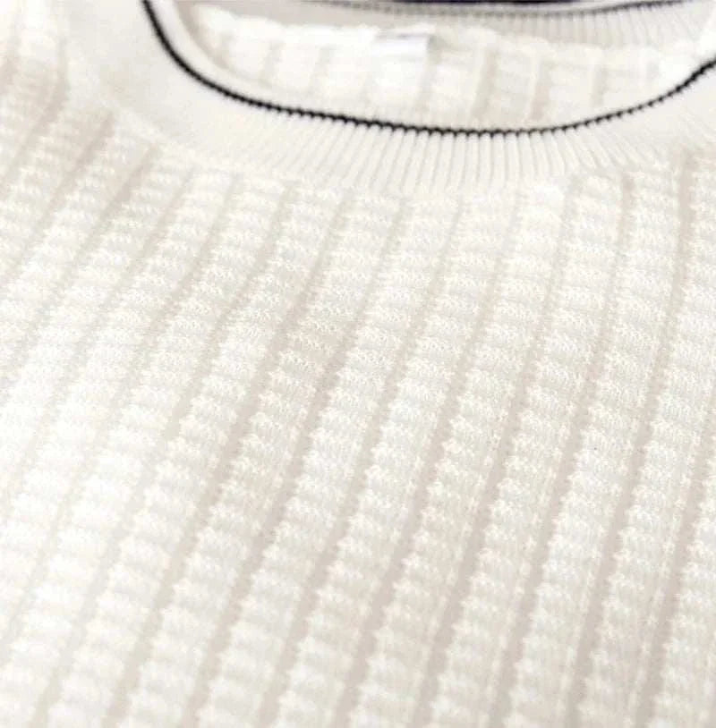 Winter wool sweater for men with ribbed texture detailing, made from a wool and polyester blend.